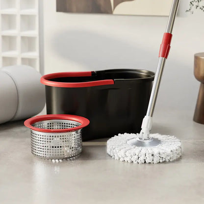 Cleaning set with black bucket, red accents, and white microfiber mop on a light-colored floor.